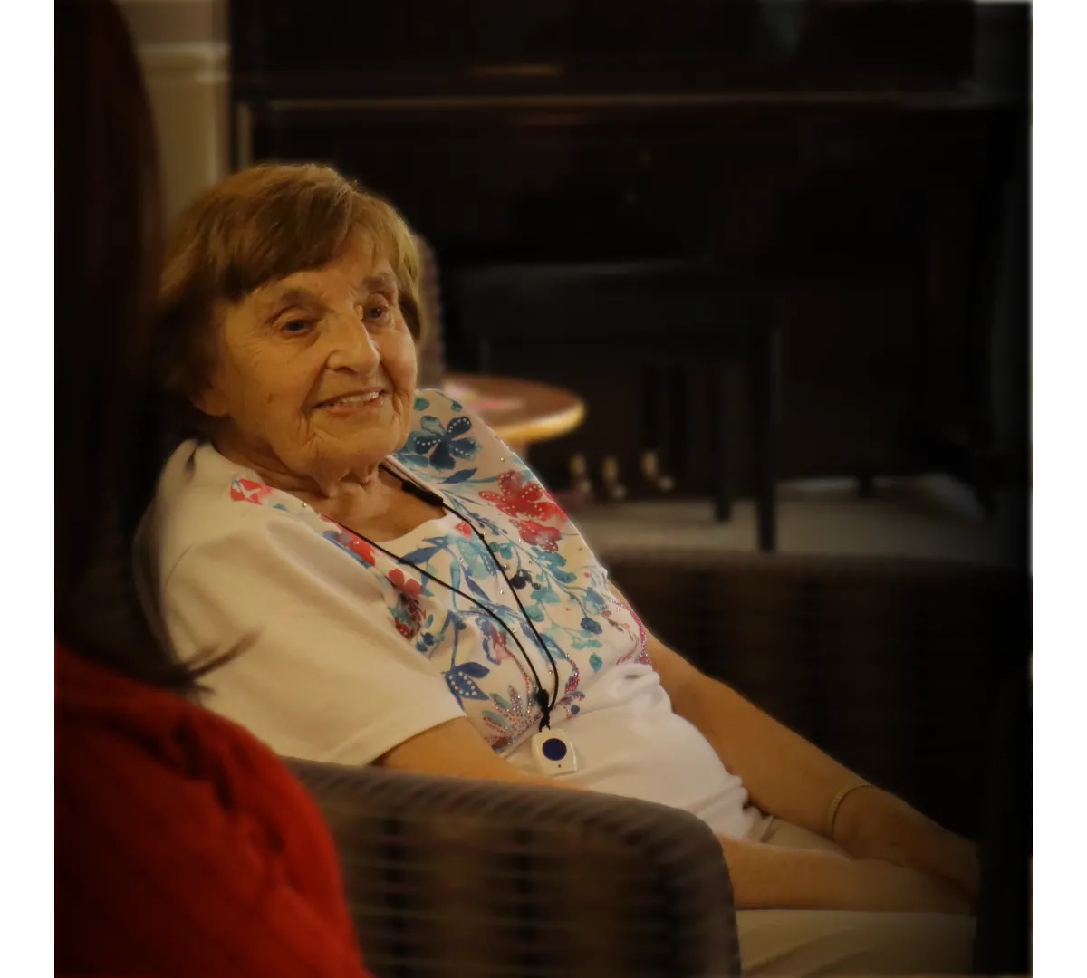 Older adult sitting in a residential care home, reflecting the people supported by adult social care services.