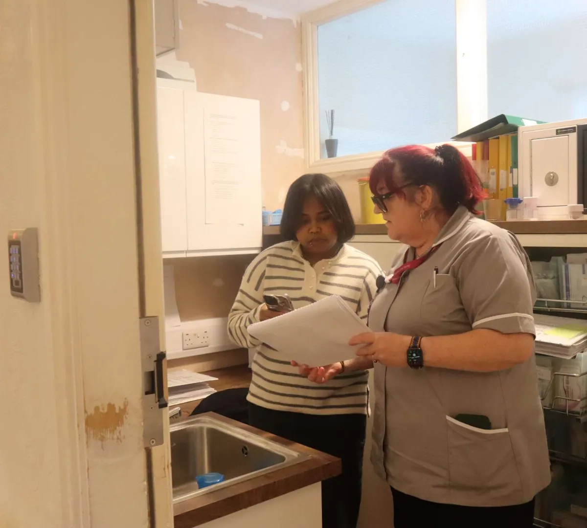 Trainee Care Assistant shadowing a senior member of staff