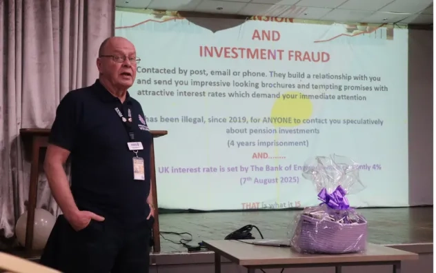 Side angle shot of Police Volunteer giving a talk about scam awareness